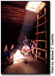 Students in a kiva at Mesa Verde National Park, Colorado.